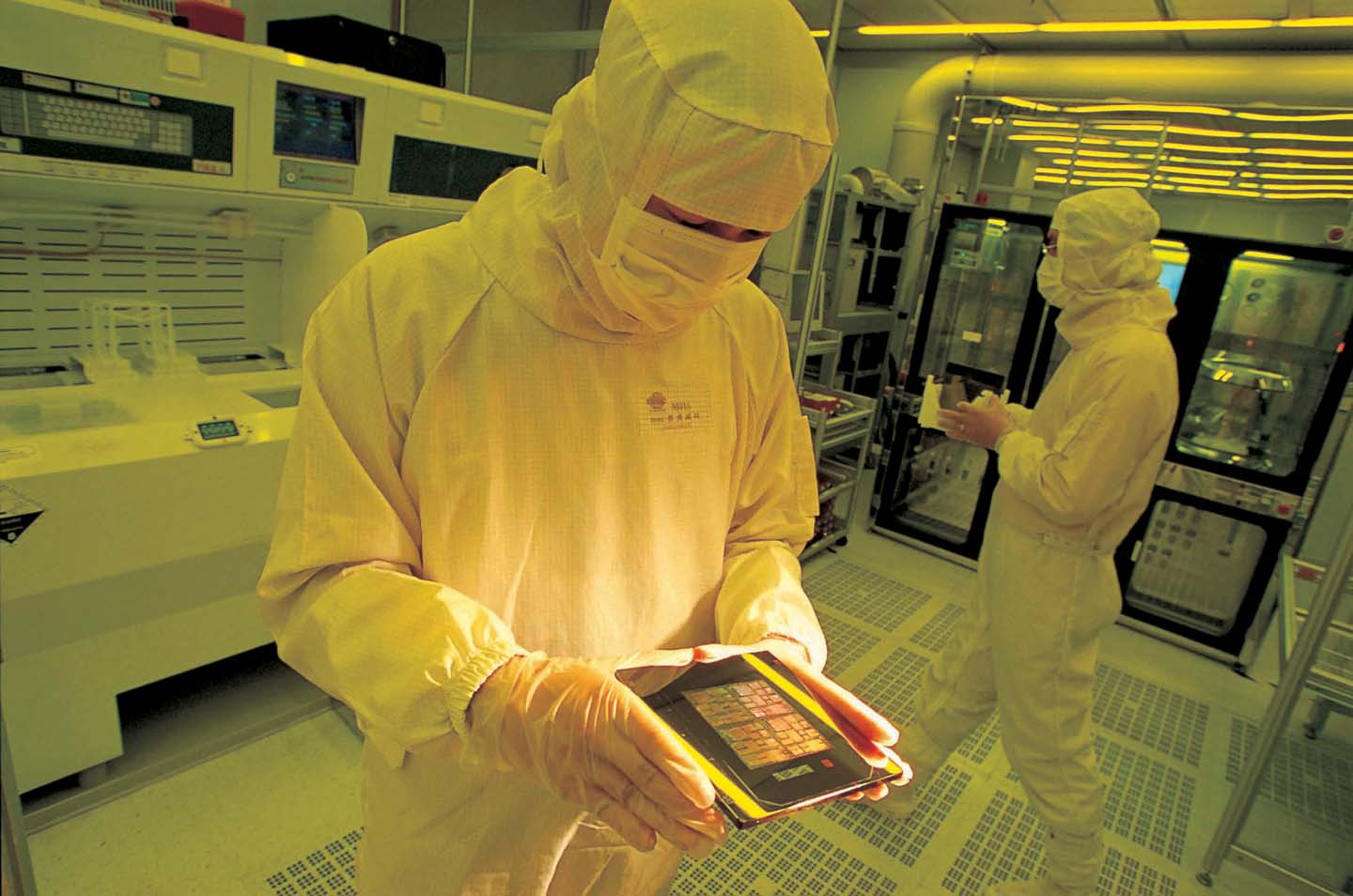 TSMC Scientist Holding Chip