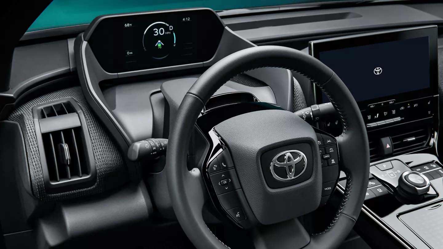 Toyota bz4x view of interior gauge cluster and steering wheel