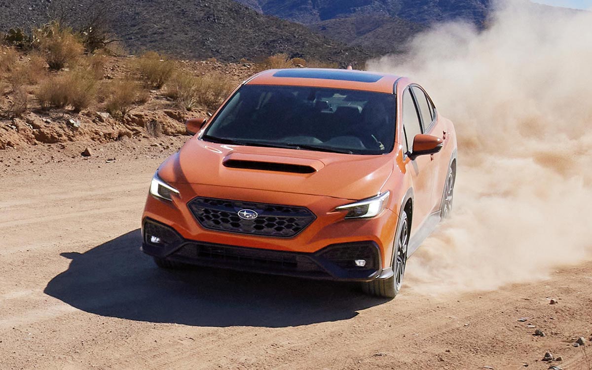 Front End View of 2022 Subaru WRX Sliding in Dirt