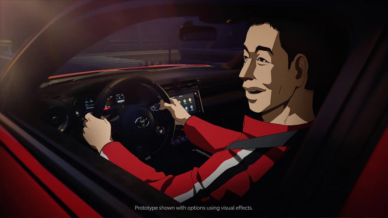 Animated version of Keiichi Tsuchiya sitting in a 2022 Toyota GR86 